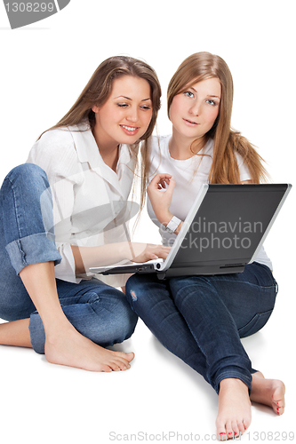 Image of two student girl with laptop