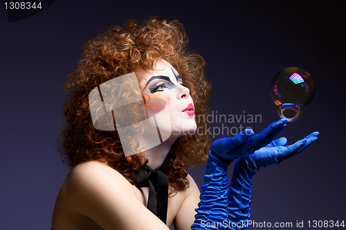 Image of woman mime with soap bubbles.