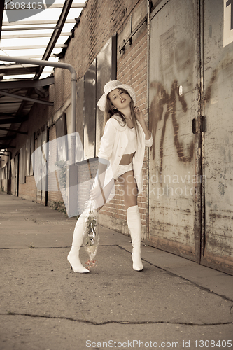 Image of beautiful young girl in white.