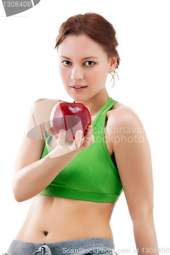 Image of woman in sportswear with apple