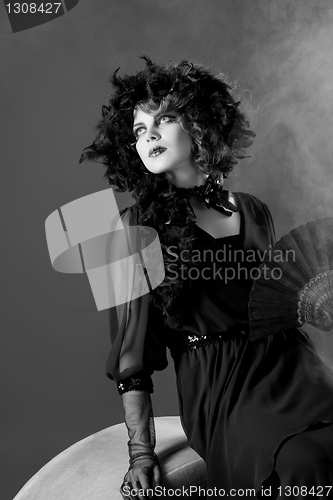 Image of Woman in old fashioned dress, in Black & White