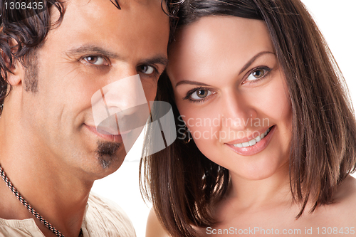 Image of Attractive young couple. Studio portrait