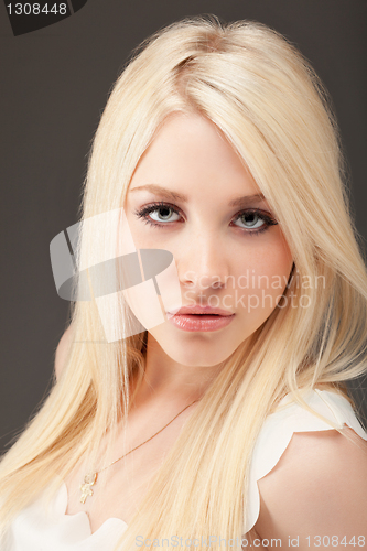 Image of young woman close up studio portrait