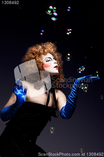 Image of woman mime with soap bubbles.