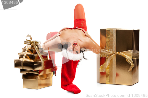 Image of Beautiful christmas woman in santa hat