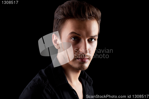 Image of Young man's portrait. Close-up face.