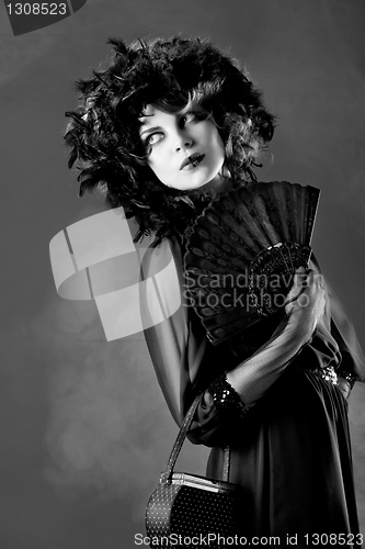 Image of Woman in old fashioned dress, in Black & White