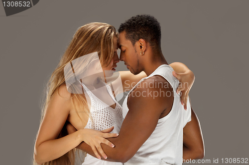 Image of Young couple dances Caribbean Salsa