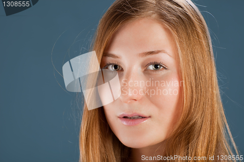 Image of Portrait of red-haired young woman