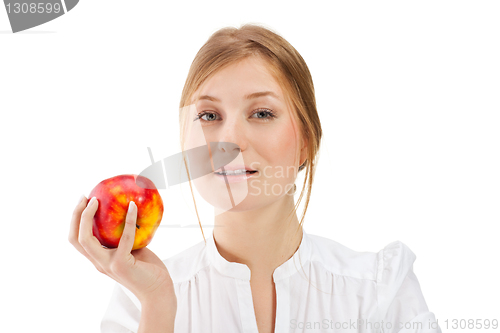 Image of Beautiful woman holding apple