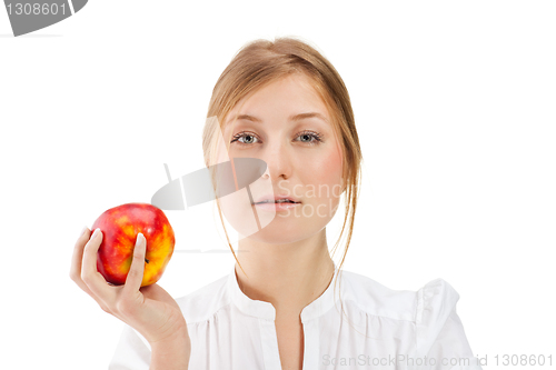 Image of Beautiful woman holding apple