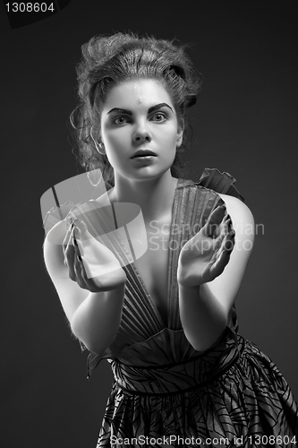 Image of Woman in old fashioned dress, in Black & White