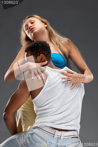 Image of Young couple dances Caribbean Salsa