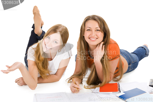 Image of two young happy student girl, isolated on white