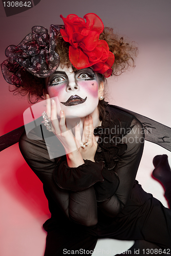 Image of woman mime with theatrical makeup