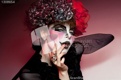 Image of woman mime with theatrical makeup