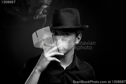 Image of Man with hat and cigar in Black & White