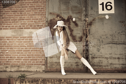 Image of beautiful young girl in white.
