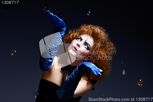 Image of woman mime with soap bubbles.