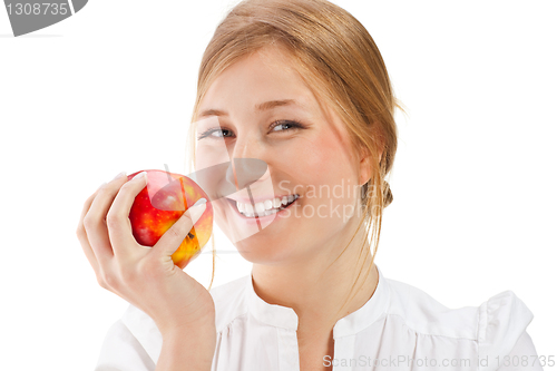 Image of Beautiful woman holding apple