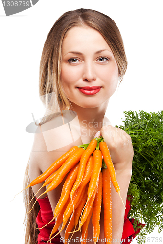 Image of attractive woman holds bunch of carrots