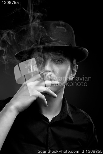 Image of Man with hat and cigar in Black & White