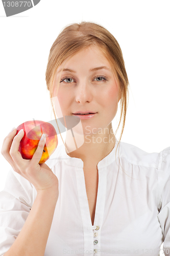 Image of Beautiful woman holding apple