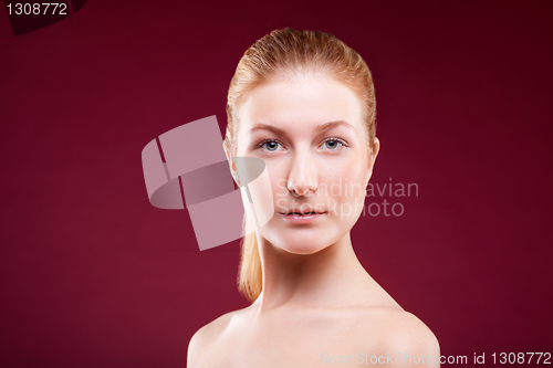 Image of Portrait of a young lady on red