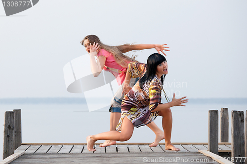 Image of two girl  are dancing