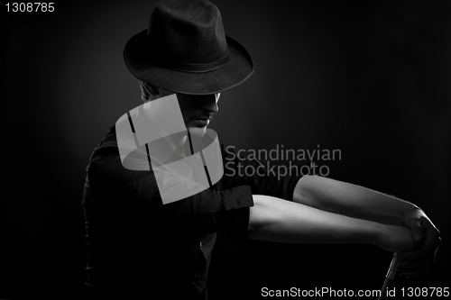 Image of Man with hat and cigar in Black & White