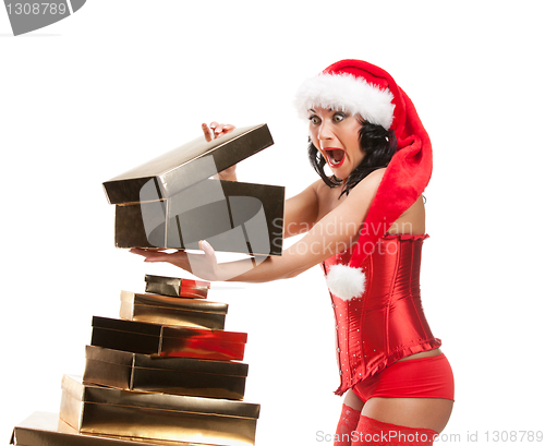 Image of Beautiful christmas woman in santa hat