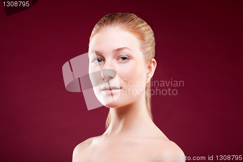 Image of Portrait of a young lady on red