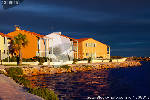 Image of seaside vacation  village at sunset, France