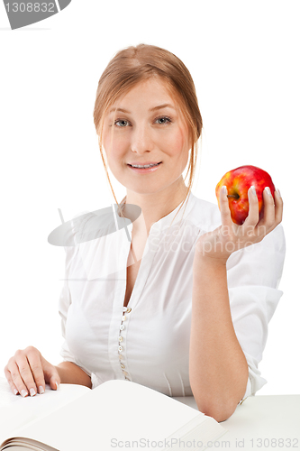 Image of woman with apple and book
