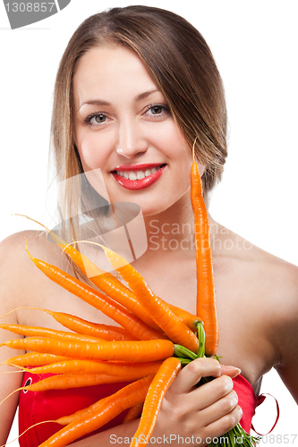Image of attractive woman holds bunch of carrots