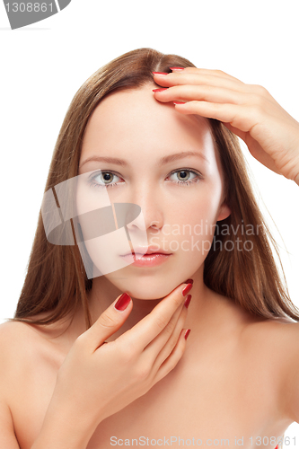 Image of young woman close up studio portrait