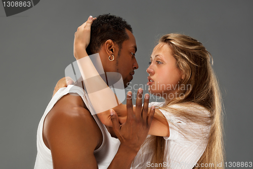 Image of Young couple dances Caribbean Salsa