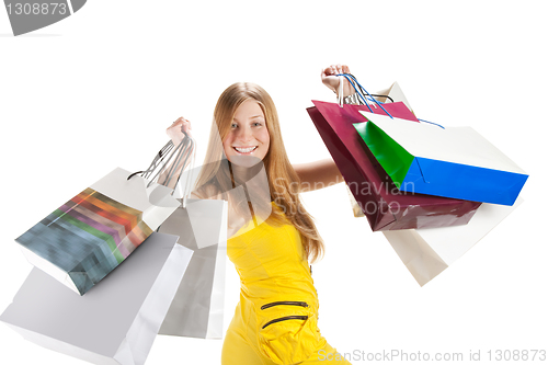 Image of Shopping. Beautiful girl with bag