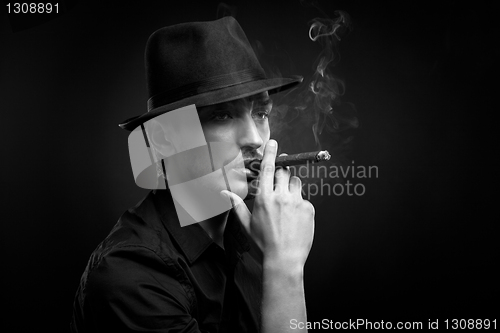 Image of Man with hat and cigar in Black & White