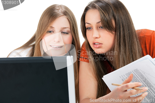 Image of two student girl with laptop
