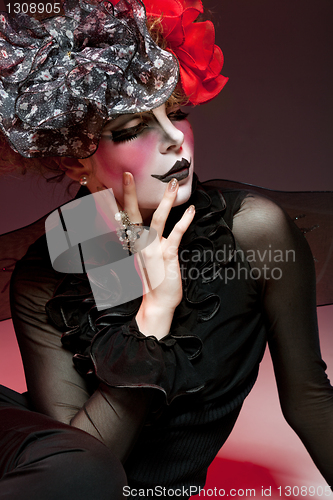 Image of woman mime with theatrical makeup