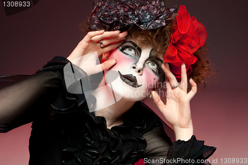 Image of woman mime with theatrical makeup