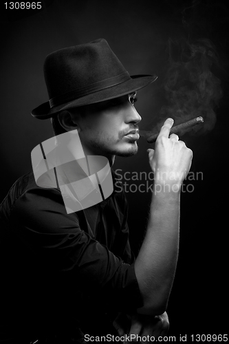 Image of Man with hat and cigar in Black & White