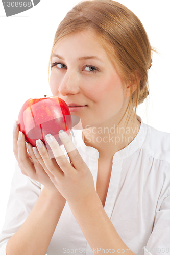 Image of Beautiful woman holding apple