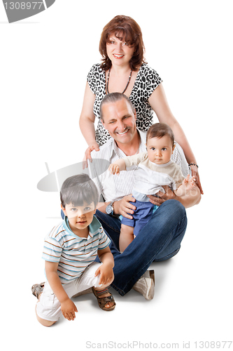 Image of Happy grandparents with two handsome grandsons