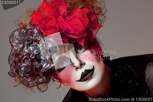 Image of woman mime with theatrical makeup