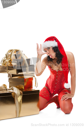 Image of Beautiful christmas woman in santa hat