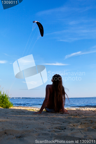 Image of girl lying on a beach