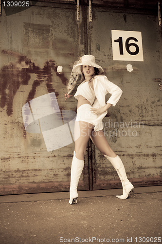 Image of beautiful young girl in white.