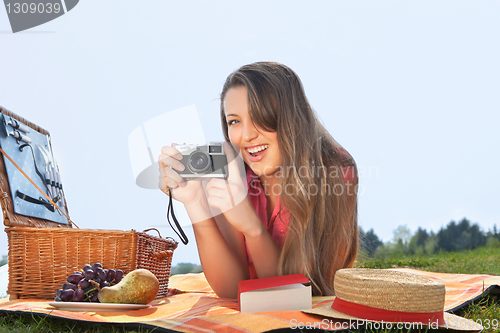 Image of young woman making a picture